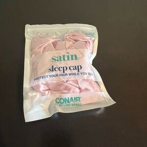 Satin Sleep cap made by CONAIR. Light pink. Protect you hair while you sleep.